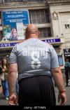 fat-man-wearing-gerrard-football-shirt-bt7xmn.jpg