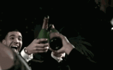 men-laughing-champagne-popping-a9xfm6wmwk94j9ih.gif